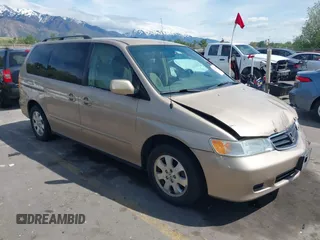 2002 Honda Odyssey EX z VIN 2HKRL18622H542316, wystawiony jako IAAI lot #42204887 z przebiegiem 251 908 mil mil oraz . Historia ofert i sprzedaży dostępna na DreamBid. Obrazek 1.