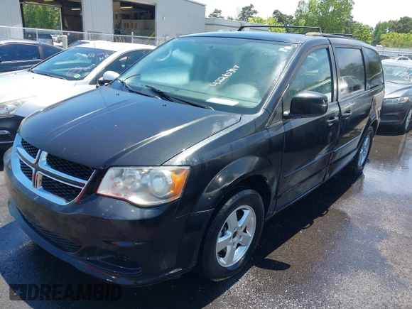 2012 Dodge Grand Caravan SXT with VIN 2C4RDGCG8CR247824, listed as a IAAI auction lot 42210397 with 200,919 mi miles and . Bid and sale history available at DreamBid. Image 2.