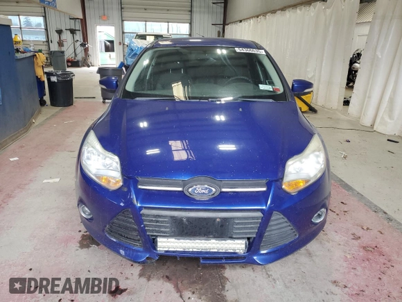 2012 Ford Focus SE z VIN 1FAHP3K23CL412887, wystawiony jako Copart lot #54366635 z przebiegiem 169 788 mil mil oraz Czysty tytuł • Clean title. Historia ofert i sprzedaży dostępna na DreamBid. Obrazek 5.
