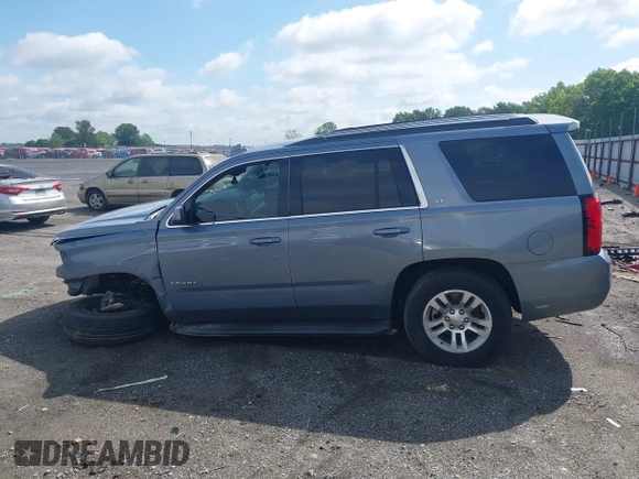 2016 Chevrolet Tahoe LT with VIN 1GNSCBKC2GR257077, listed as a IAAI auction lot 42091171 with 118,660 mi miles and . Bid and sale history available at DreamBid. Image 14.