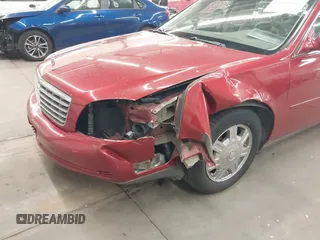 2005 Cadillac DeVille z VIN 1G6KD57Y85U107418, wystawiony jako IAAI lot #42352987 z przebiegiem 160 974 mil mil oraz . Historia ofert i sprzedaży dostępna na DreamBid. Obrazek 6.