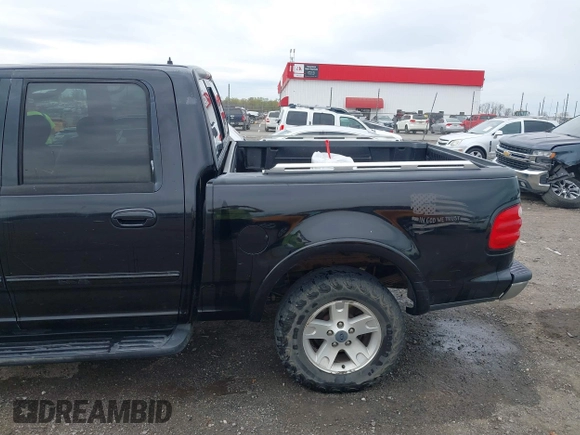 2002 Ford F-150 XLT with VIN 1FTRW08L32KD90202, listed as a IAAI auction lot 41850546 with 256,807 mi miles. Bid and sale history available at carsss.com. Image 18.