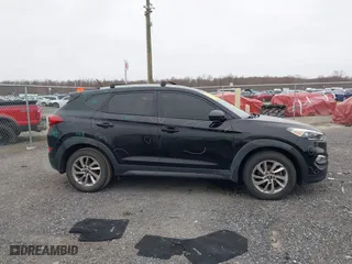 2016 Hyundai Tucson SE with VIN KM8J33A4XGU179953, listed as a IAAI auction lot 41771885 with 103,139 mi miles. Bid and sale history available at carsss.com. Image 13.