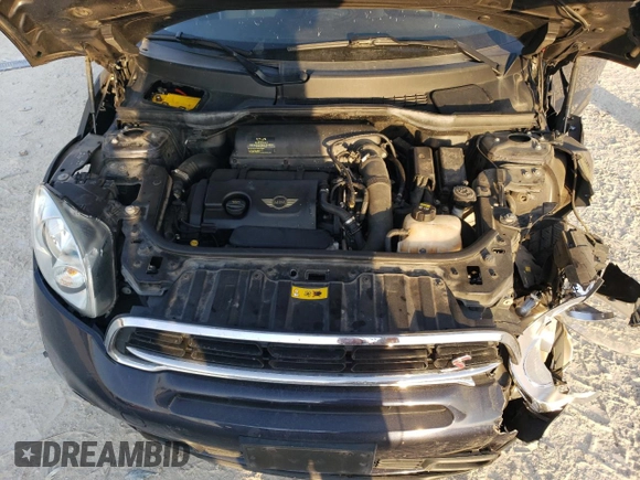 2015 MINI Countryman S with VIN WMWZC5C57FWP48606, listed as a Copart auction lot 47212255 with 104,922 mi miles and Salvage Title. Bid and sale history available at DreamBid. Image 11.