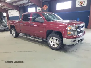 2014 Chevrolet Silverado 1500 LT with VIN 1GCUKREC9EF195006, listed as a Copart auction lot 54220595 with 165,478 mi miles and Clean Title. Bid and sale history available at DreamBid. Image 4.