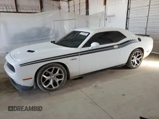 2015 Dodge Challenger SXT Plus с VIN 2C3CDZBGXFH914023, выставлен на аукционе Copart как лот 52137955 с пробегом 118 123 миль миль и Списание • Salvage title. История ставок и продаж доступна на DreamBid. Изображение 1.
