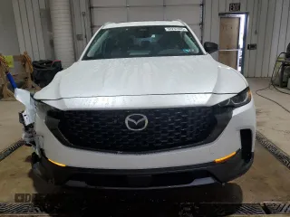 2025 Mazda CX-50 S Premium z VIN 7MMVABDM8SN311953, wystawiony jako Copart lot #58232445 z przebiegiem 5 932 mil mil oraz Szkoda całkowita • Salvage title. Historia ofert i sprzedaży dostępna na DreamBid. Obrazek 5.