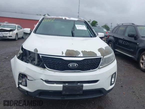 2015 Kia Sorento LX with VIN 5XYKTCA63FG586054, listed as a IAAI auction lot 42246543 with 159,427 mi miles and . Bid and sale history available at DreamBid. Image 12.
