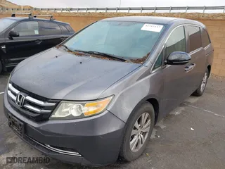2016 Honda Odyssey SE with VIN 5FNRL5H30GB034980, listed as a IAAI auction lot 41512117 with 97,644 mi miles. Bid and sale history available at carsss.com. Image 2.