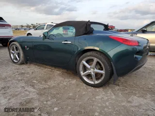 2006 Pontiac Solstice with VIN 1G2MB35B16Y117219, listed as a Copart auction lot 73632454 with 59,907 mi miles and Salvage Title. Bid and sale history available at carsss.com. Image 2.