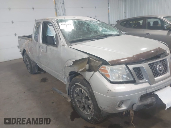 2015 Nissan Frontier SV with VIN 1N6AD0CW4FN751068, listed as a IAAI auction lot 41024078 with 900,000 mi miles and . Bid and sale history available at DreamBid. Image 6.