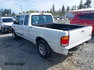 1999 Ford Ranger XLT with VIN 1FTYR14X0XPA65325, listed as a IAAI auction lot 42009611 with 218,657 mi miles. Bid and sale history available at carsss.com. Image 3.