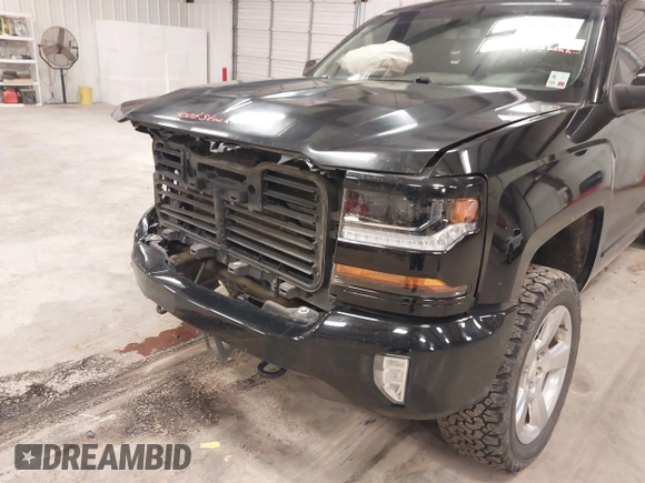2017 Chevrolet Silverado 1500 LT with VIN 3GCUKREC6HG501307, listed as a IAAI auction lot 41611899 with 133,863 mi miles and . Bid and sale history available at DreamBid. Image 18.