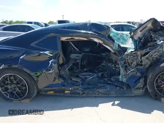 2014 Chevrolet Camaro LS z VIN 2G1FA1E32E9126043, wystawiony jako IAAI lot #42253189 z przebiegiem 104 457 mil mil oraz . Historia ofert i sprzedaży dostępna na DreamBid. Obrazek 13.