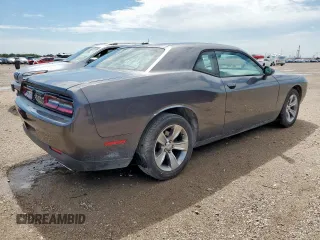 2016 Dodge Challenger SXT with VIN 2C3CDZAGXGH265147, listed as a Copart auction lot 59599185 with 83,671 mi miles and Salvage title. Bid and sale history available at DreamBid. Image 3.