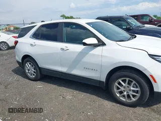 2022 Chevrolet Equinox LT z VIN 3GNAXUEV9NL174839, wystawiony jako IAAI lot #42470518 z przebiegiem 18 709 mil mil oraz . Historia ofert i sprzedaży dostępna na DreamBid. Obrazek 13.