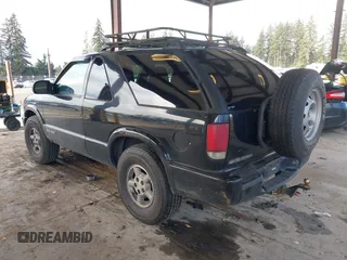 1999 Chevrolet Blazer LS with VIN 1GNCT18W3XK216840, listed as a IAAI auction lot 41534524 with 199,982 mi miles and . Bid and sale history available at DreamBid. Image 3.