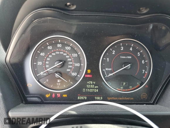 2016 BMW 2 Series M235i with VIN WBA1M1C52GV394052, listed as a Copart auction lot 82261594 with 83,979 mi miles and Salvage Title. Bid and sale history available at carsss.com. Image 9.