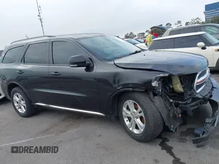 2012 Dodge Durango Crew with VIN 1C4SDHDT0CC321037, listed as a IAAI auction lot 42793232 with 162,593 mi miles and . Bid and sale history available at DreamBid. Image 14.