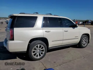 2015 GMC Yukon Denali z VIN 1GKS2CKJ6FR706151, wystawiony jako Copart lot #50556805 z przebiegiem 174 259 mil mil oraz Czysty tytuł • Clean title. Historia ofert i sprzedaży dostępna na DreamBid. Obrazek 3.