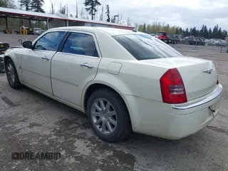2007 Chrysler 300 C with VIN 2C3KA63HX7H898174, listed as a IAAI auction lot 42000604 with 73,493 mi miles. Bid and sale history available at carsss.com. Image 3.