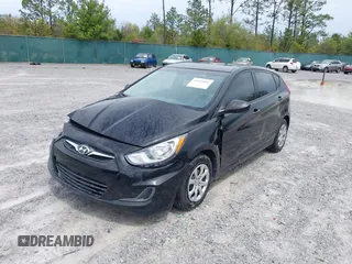 2014 Hyundai Accent GS with VIN KMHCT5AE7EU164658, listed as a IAAI auction lot 41911092 with 132,442 mi miles. Bid and sale history available at carsss.com. Image 2.