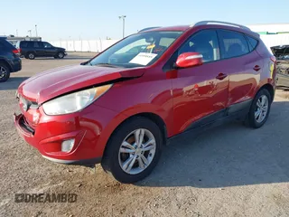 2013 Hyundai Tucson GLS with VIN KM8JU3AC6DU763590, listed as a IAAI auction lot 41999555 with 149,960 mi miles. Bid and sale history available at carsss.com. Image 17.