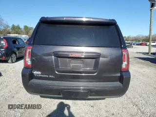2015 GMC Yukon XL SLT with VIN 1GKS1HKC3FR188825, listed as a Copart auction lot 88904935 with 201,178 mi miles and Salvage Title. Bid and sale history available at carsss.com. Image 6.