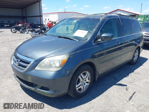 2006 Honda Odyssey EX-L with VIN 5FNRL38796B452606, listed as a IAAI auction lot 42173853 with 190,084 mi miles and . Bid and sale history available at DreamBid. Image 2.