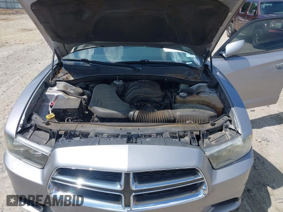 2013 Dodge Charger SE z VIN 2C3CDXBG0DH639988, wystawiony jako IAAI lot #40032112 z przebiegiem 197 941 mil mil oraz . Historia ofert i sprzedaży dostępna na DreamBid. Obrazek 10.
