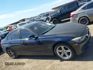 2015 BMW 3 Series 320i with VIN WBA3B1C53FK138310, listed as a IAAI auction lot 41677208 with 57,891 mi miles. Bid and sale history available at carsss.com. Image 13.