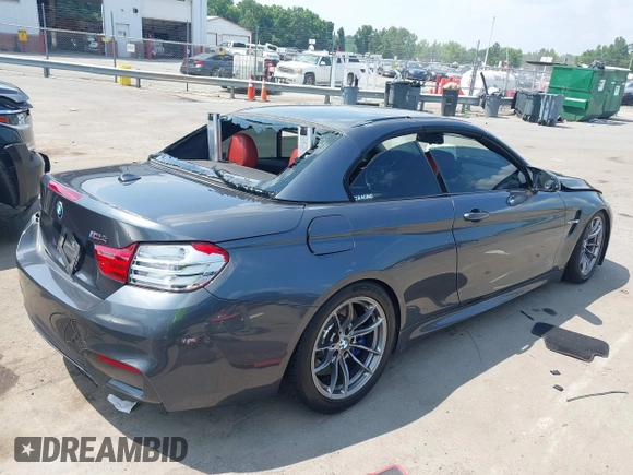 2015 BMW M4 with VIN WBS3U9C5XFJ967725, listed as a IAAI auction lot 42593444 with Not provided miles and . Bid and sale history available at DreamBid. Image 4.