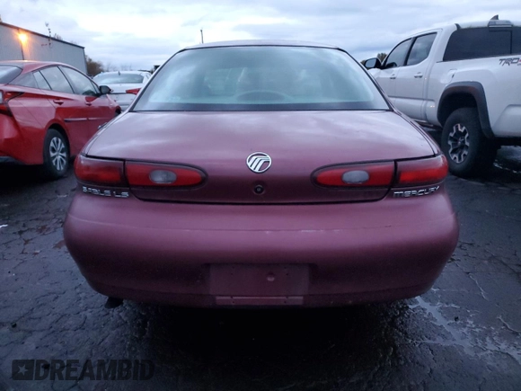 1996 Mercury Sable LS z VIN 1MELM53S9TG646191, wystawiony jako Copart lot #81002674 z przebiegiem 163 808 mil mil oraz Tytuł czysty. Historia ofert i sprzedaży dostępna na DreamBid. Obrazek 6.