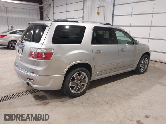 2011 GMC Acadia Denali with VIN 1GKKRTEDXBJ401178, listed as a IAAI auction lot 41583945 with 152,053 mi miles and . Bid and sale history available at DreamBid. Image 4.