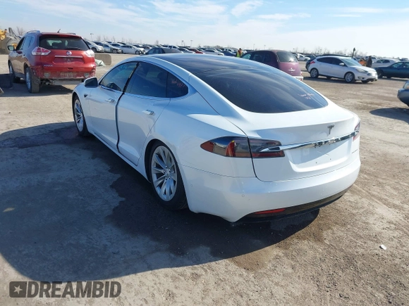 2020 Tesla Model S Long Range with VIN 5YJSA1E23LF360441, listed as a IAAI auction lot 41312865 with 68,967 mi miles and . Bid and sale history available at DreamBid. Image 3.
