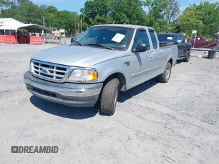 2003 Ford F-150 XL with VIN 1FTRX17W43NA77481, listed as a IAAI auction lot 42155310 with 230,322 mi miles. Bid and sale history available at carsss.com. Image 2.