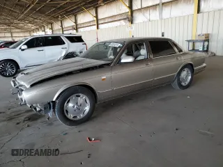 1997 Jaguar XJ with VIN SAJHX1244VC810274, listed as a Copart auction lot 63093015 with Not provided miles and Salvage title. Bid and sale history available at DreamBid. Image 1.