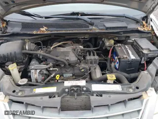 2010 Chrysler Town & Country Touring with VIN 2A4RR5D12AR265985, listed as a IAAI auction lot 41970445 with 125,635 mi miles. Bid and sale history available at carsss.com. Image 10.