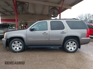 2014 GMC Yukon SLT with VIN 1GKS1CE00ER164663, listed as a IAAI auction lot 41547771 with 178,998 mi miles. Bid and sale history available at carsss.com. Image 14.