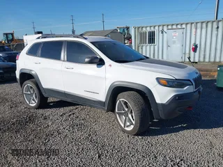 2021 Jeep Cherokee Trailhawk with VIN 1C4PJMBX9MD105888, listed as a IAAI auction lot 42065175 with 55,469 mi miles and . Bid and sale history available at DreamBid. Image 1.