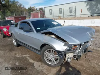 2012 Ford Mustang Premium with VIN 1ZVBP8AM4C5259244, listed as a IAAI auction lot 38337898 with 98,837 mi miles and . Bid and sale history available at carsss.com. Image 1.