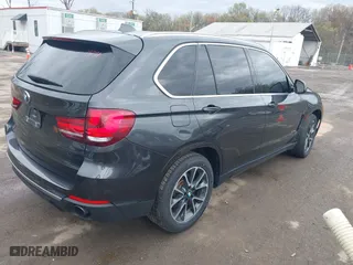 2017 BMW X5 xDrive35i with VIN 5UXKR0C35H0V76620, listed as a IAAI auction lot 41944975 with 147,667 mi miles. Bid and sale history available at carsss.com. Image 4.