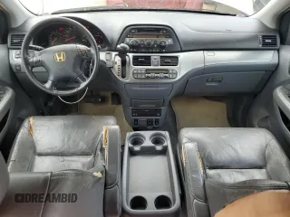 2006 Honda Odyssey EX-L z VIN 5FNRL387X6B458818, wystawiony jako Copart lot #61801335 z przebiegiem 227 179 mil mil oraz Czysty tytuł • Clean title. Historia ofert i sprzedaży dostępna na DreamBid. Obrazek 8.