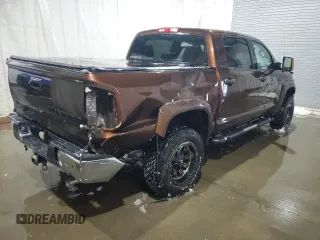2014 Toyota Tundra Limited z VIN 5TFHY5F18EX411007, wystawiony jako Copart lot #43234915 z przebiegiem 172 193 mil mil oraz Szkoda całkowita • Salvage title. Historia ofert i sprzedaży dostępna na DreamBid. Obrazek 3.