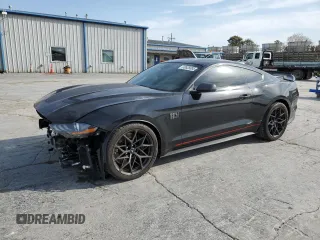 2021 Ford Mustang Mach 1 with VIN 1FA6P8R04M5552462, listed as a Copart auction lot 50628385 with 19,556 mi miles and Salvage Title. Bid and sale history available at carsss.com. Image 1.