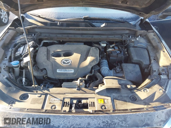 2019 Mazda CX-5 Signature with VIN JM3KFBEY5K0656965, listed as a IAAI auction lot 41421453 with 99,073 mi miles. Bid and sale history available at carsss.com. Image 10.