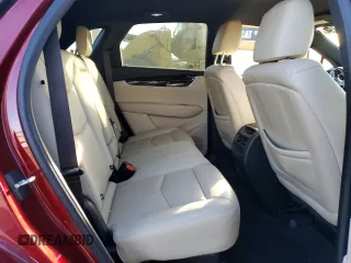 2018 Cadillac XT5 FWD with VIN 1GYKNARS2JZ241702, listed as a Copart auction lot 84031294 with 67,866 mi miles and Salvage title. Bid and sale history available at DreamBid. Image 11.