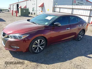 2016 Nissan Maxima Platinum z VIN 1N4AA6AP1GC416590, wystawiony jako IAAI lot #41817288 z przebiegiem 248 514 mil mil oraz . Historia ofert i sprzedaży dostępna na DreamBid. Obrazek 2.