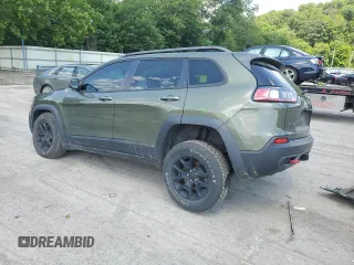 2021 Jeep Cherokee Trailhawk z VIN 1C4PJMBX0MD185078, wystawiony jako Copart lot #63264765 z przebiegiem 92 393 mil mil oraz Szkoda całkowita • Salvage title. Historia ofert i sprzedaży dostępna na DreamBid. Obrazek 2.