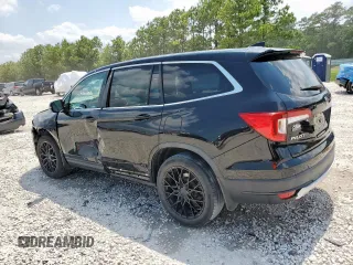 2019 Honda Pilot EX-L with VIN 5FNYF5H59KB044310, listed as a Copart auction lot 58580895 with 210,131 mi miles and Salvage title. Bid and sale history available at DreamBid. Image 2.